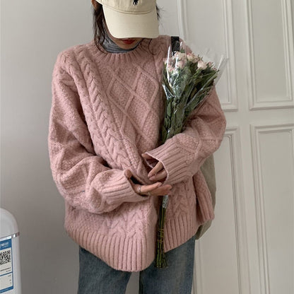 Women Wearing Loose Sweaters Outside The Street With Gentle Wind
