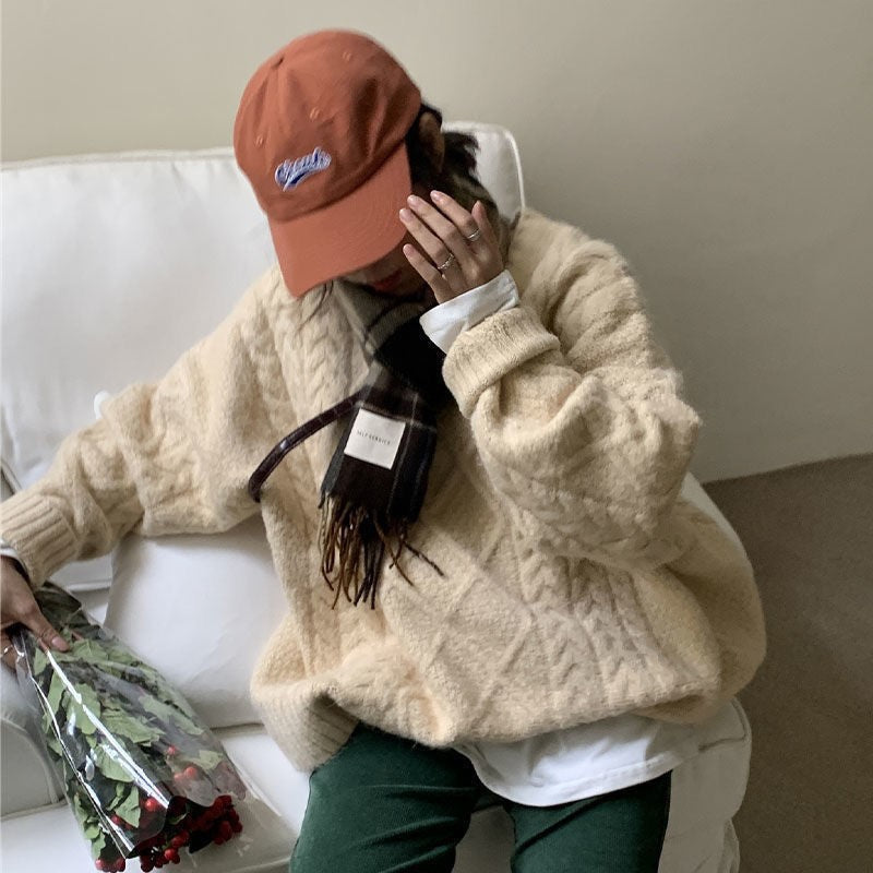 Women Wearing Loose Sweaters Outside The Street With Gentle Wind